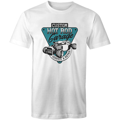 A light blue t-shirt featuring a large graphic print on the chest. The graphic is a teal and black triangular badge with the text 'CUSTOM HOT ROD Garage' and 'SERVICE & REPAIR since 1981', surrounding an illustration of a classic hot rod car with an exposed engine.elements.
