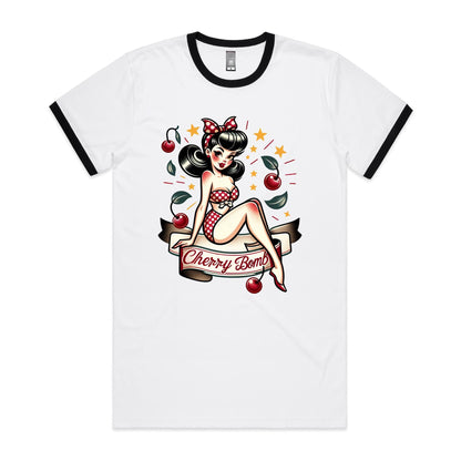 A white crew neck t-shirt with a printed graphic of a pin-up style illustration featuring a female character with cherry blossoms and the text 'CHERRY BOMB'.