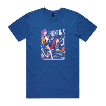 A close-up of a graphic t-shirt featuring three illustrated anime-style female characters with colorful hair and outfits, surrounded by stars and the text 'HUNTR/X'.
