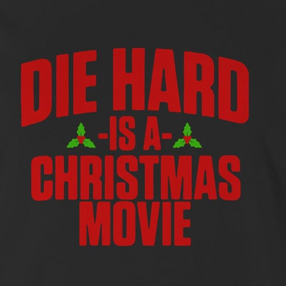 A black women's t-shirt with the text 'DIE HARD IS A CHRISTMAS MOVIE' printed in red and white.