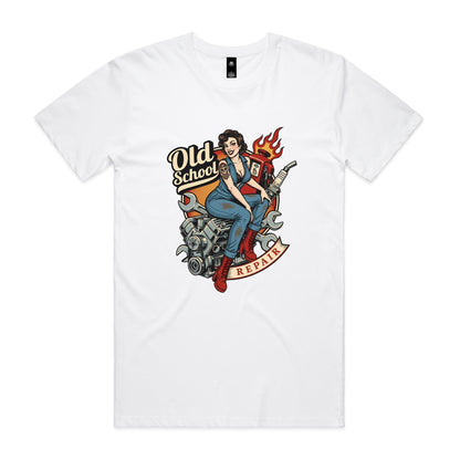 A vintage-style pin-up illustration printed on a white garment, showing a woman in blue overalls and red boots sitting on a motorcycle engine with wrenches, a gas pump, flames, and the words 'Old School' and 'REPAIR'.