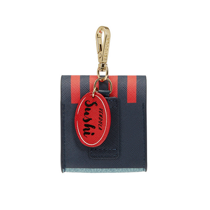 Small black and red wallet with a keychain on a white background