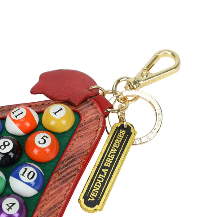 Keychain with pool ball design and Vendula Breweries tag on a white background