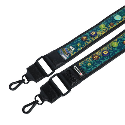 Guitar strap with decorative pattern on a white background
