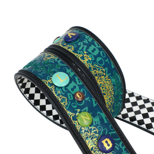 Colorful guitar strap with decorative patterns and lettering on a white background