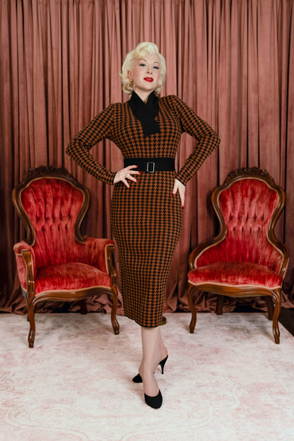 Marilyn’s iconic style in Gentlemen Prefer Blondes, the Miss Lee Knit Dress brings classic 1950s sophistication into a sleek, curve loving silhouette.