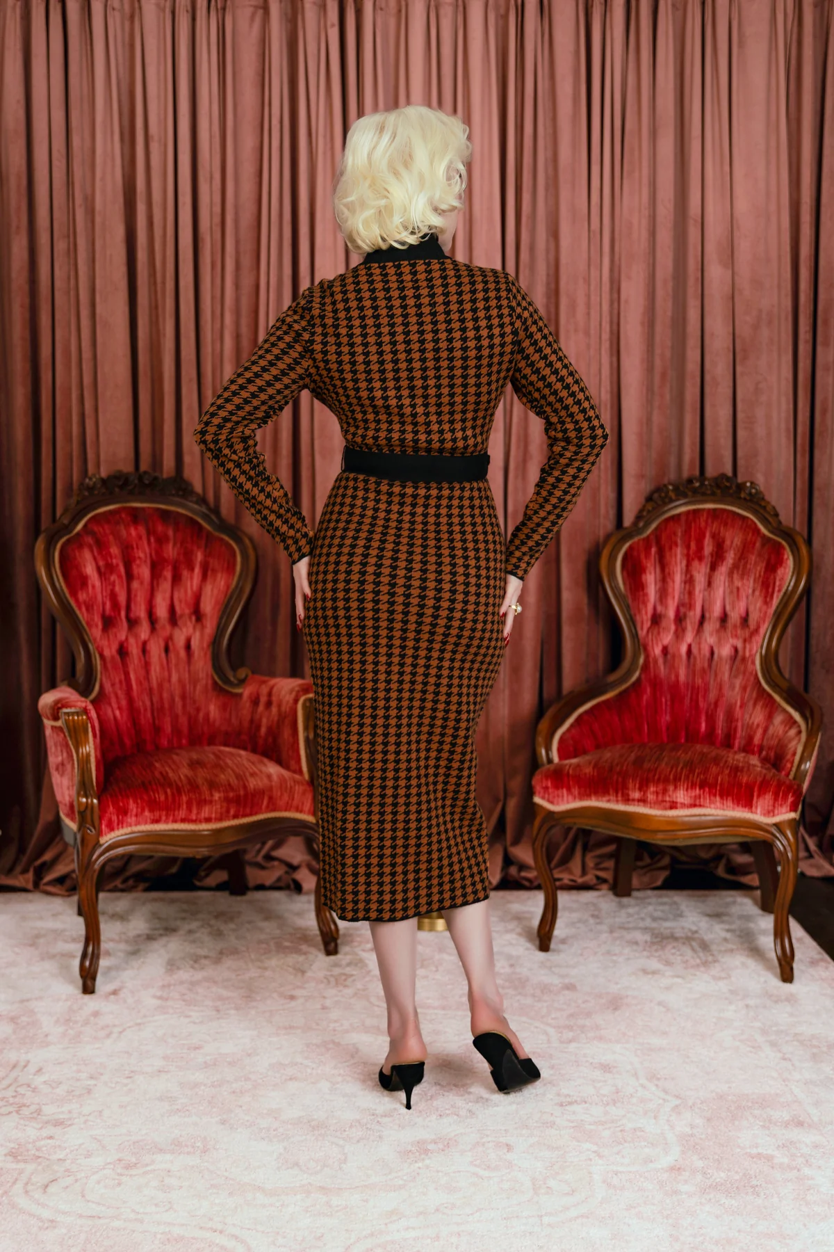 Marilyn’s iconic style in Gentlemen Prefer Blondes, the Miss Lee Knit Dress brings classic 1950s sophistication into a sleek, curve loving silhouette.