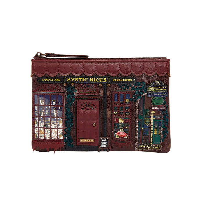 Pouch designed like a store front with 'Mystic Wicks' branding on a white background