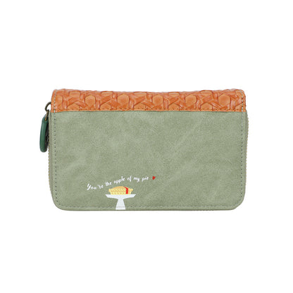 Green wallet with orange top section on a white background