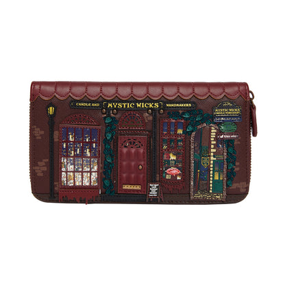 Designer handbag with detailed facade design on a white background