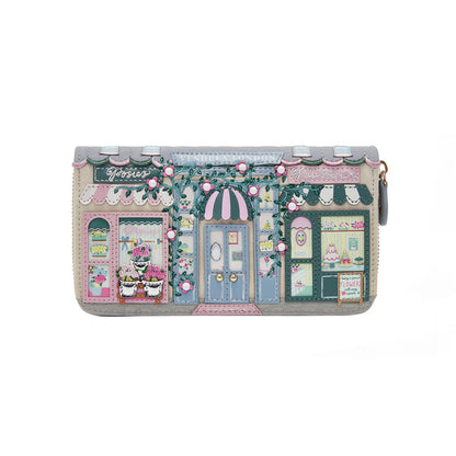 Wallet with a design of a quaint street scene on a white background