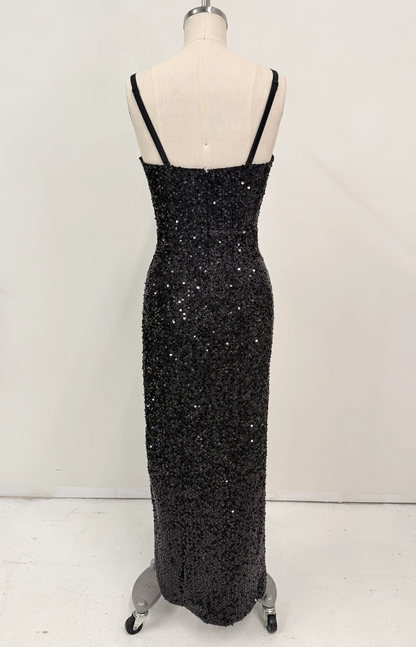 A black sequined evening gown displayed on a cream dress form mannequin against a plain white studio background.