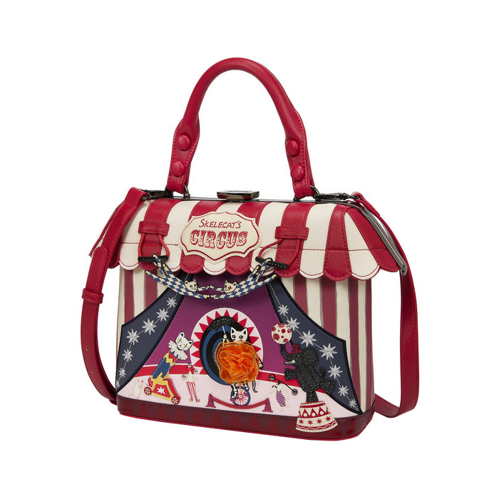 Circus-themed handbag with red, white, and purple design on a white background