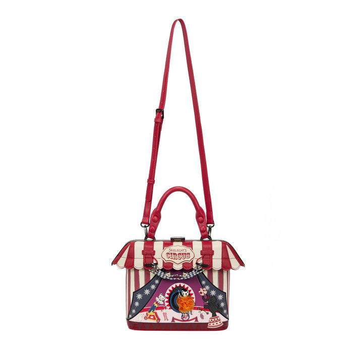 Circus-themed handbag with red and white striped canopy on a white background