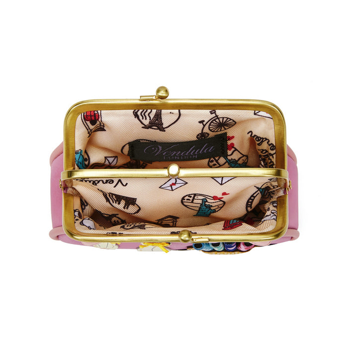 Small clutch bag with gold frame and colorful pattern on a white background