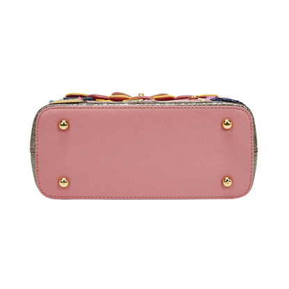 Pink handbag with gold accents on a white background