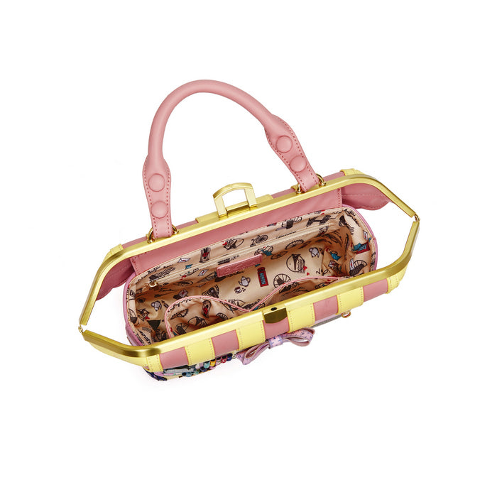 Pink and gold handbag with floral interior on a white background
