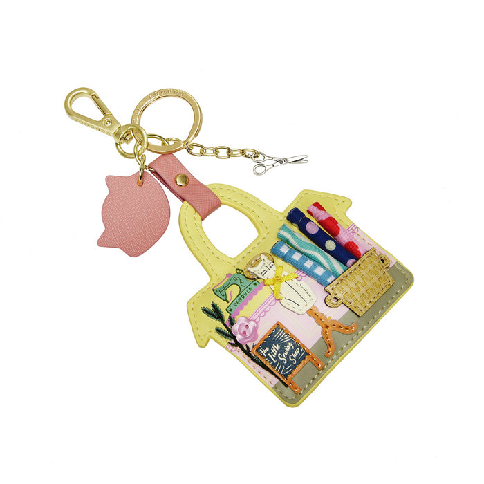 Colorful keychain with a handbag design on a white background