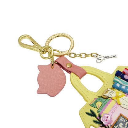 Colorful keychain with a handbag charm on a white background