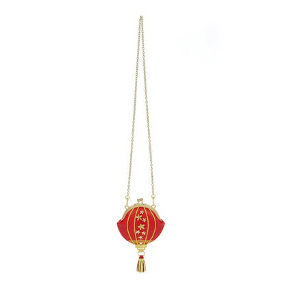 Red lantern-shaped pendant with gold chain on a white background