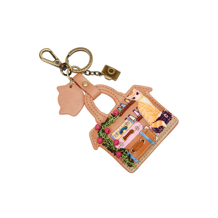 Keychain with a suitcase design featuring a cat and flowers on a white background