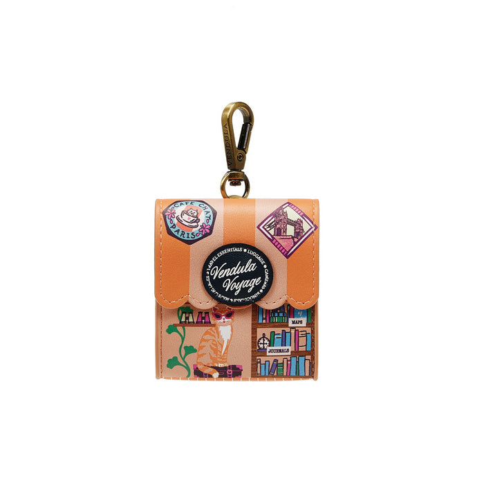 Small leather pouch with stickers and a zipper pull on a white background