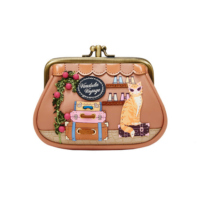 Coin purse with travel-themed design featuring a cat, suitcases, and books on a white background.
