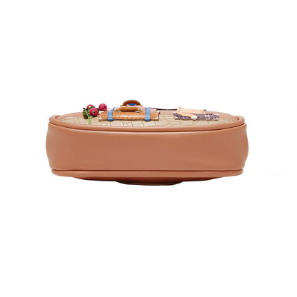 Brown rectangular container with decorative items on a white background