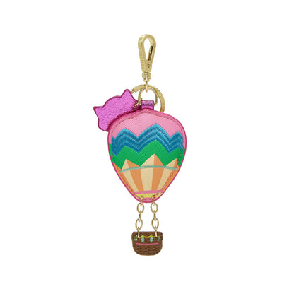Colorful hot air balloon keychain with a pink bow on a white background