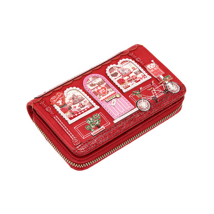 Red wallet with decorative designs on a white background