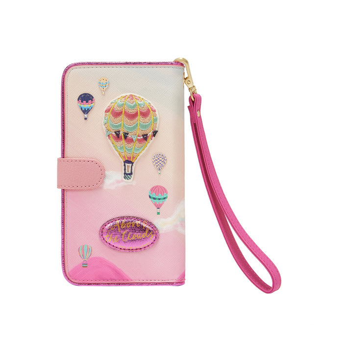 Pink wallet with hot air balloon design on a white background