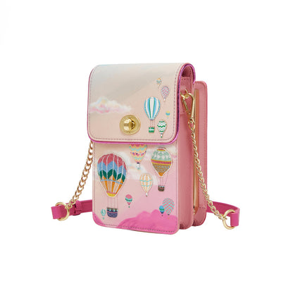 Pink crossbody bag with hot air balloon design on a white background