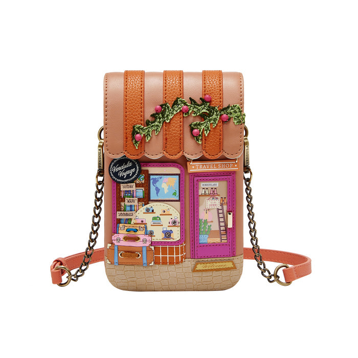 House-shaped crossbody bag with decorative elements on a white background
