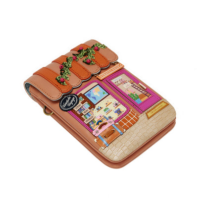 Phone case designed like a quaint store with colorful details on a white background