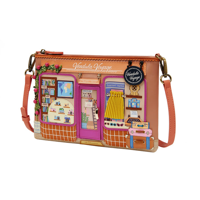 Crossbody bag with detailed design on a white background