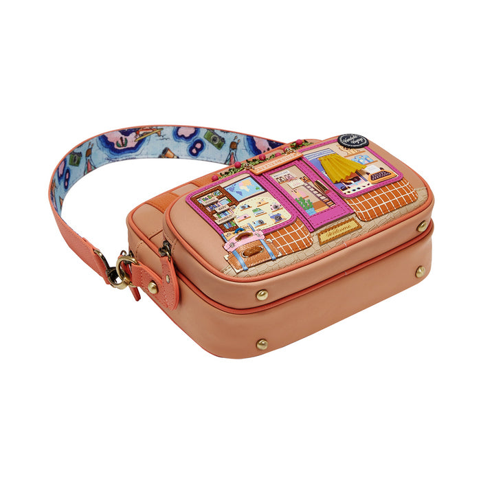 Pink handbag with cartoon character design on a white background