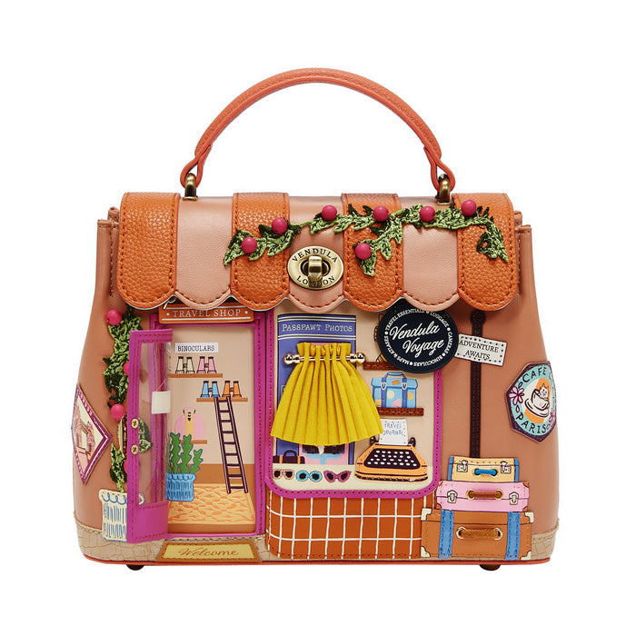 Handbag designed like a miniature store with various elements and decorations on a white background