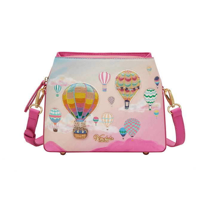 Pink handbag with hot air balloon design on a white background