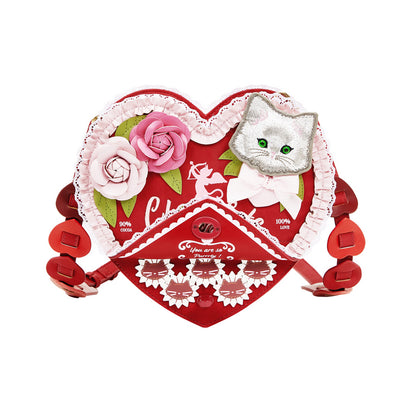 Heart-shaped product with a cat and floral design on a white background