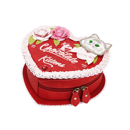 Red heart-shaped bag with 'Chocolate Kittens' text and cat design on a white background