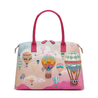 Handbag with hot air balloon design on a white background