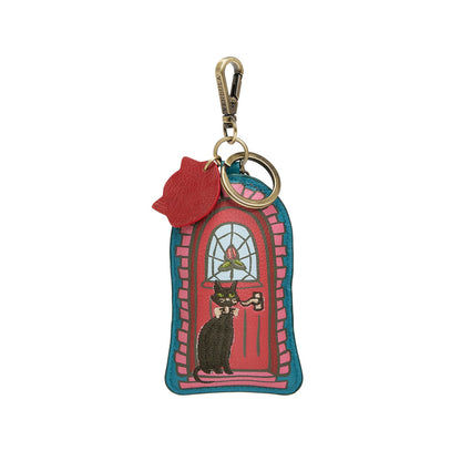 Keychain with a design of a cat at a door on a white background