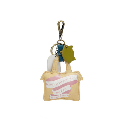 Keychain with a small bag design and text on a white background