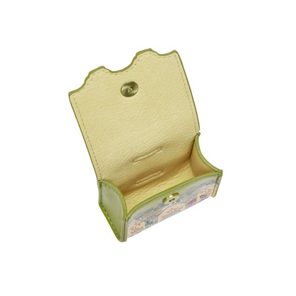 Small green leather wallet with floral pattern on a white background