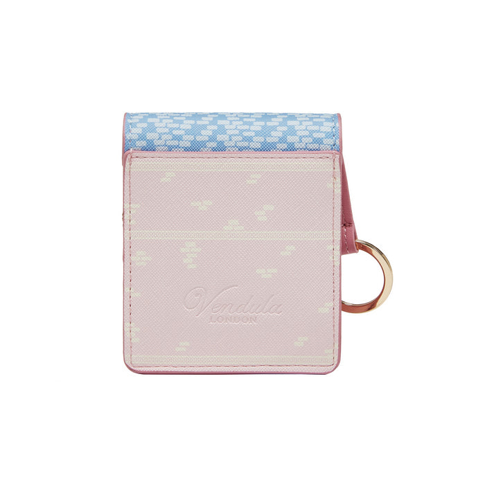 Small pink wallet with blue and white patterned top on a white background