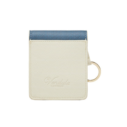 Small cream-colored pouch with blue top section and gold ring on a white background