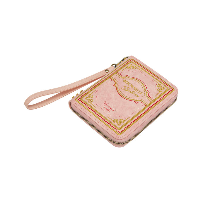 Pink wallet with gold accents on a white background