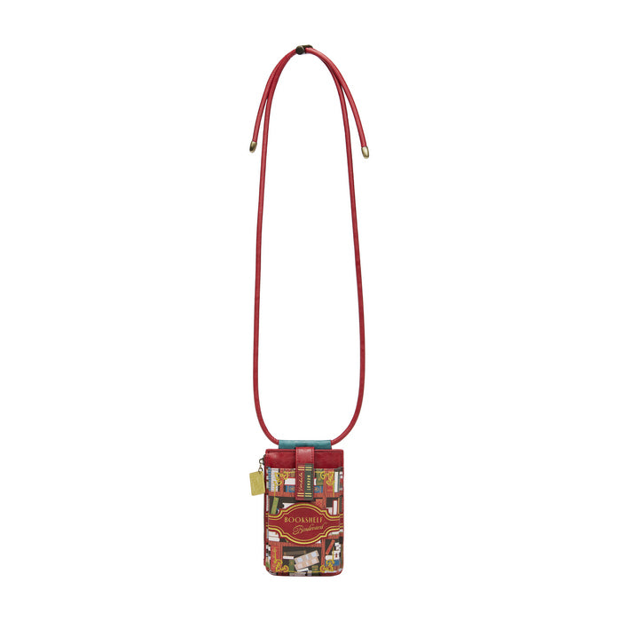 Red crossbody bag with a patterned base on a white background