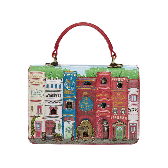 Handbag with colorful architectural design on a white background