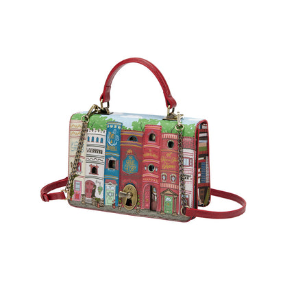 Handbag with colorful architectural design on a white background
